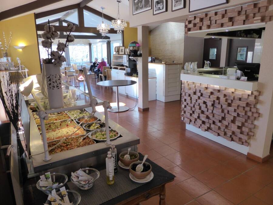 Breakfast, lunch, dinner served; garden views