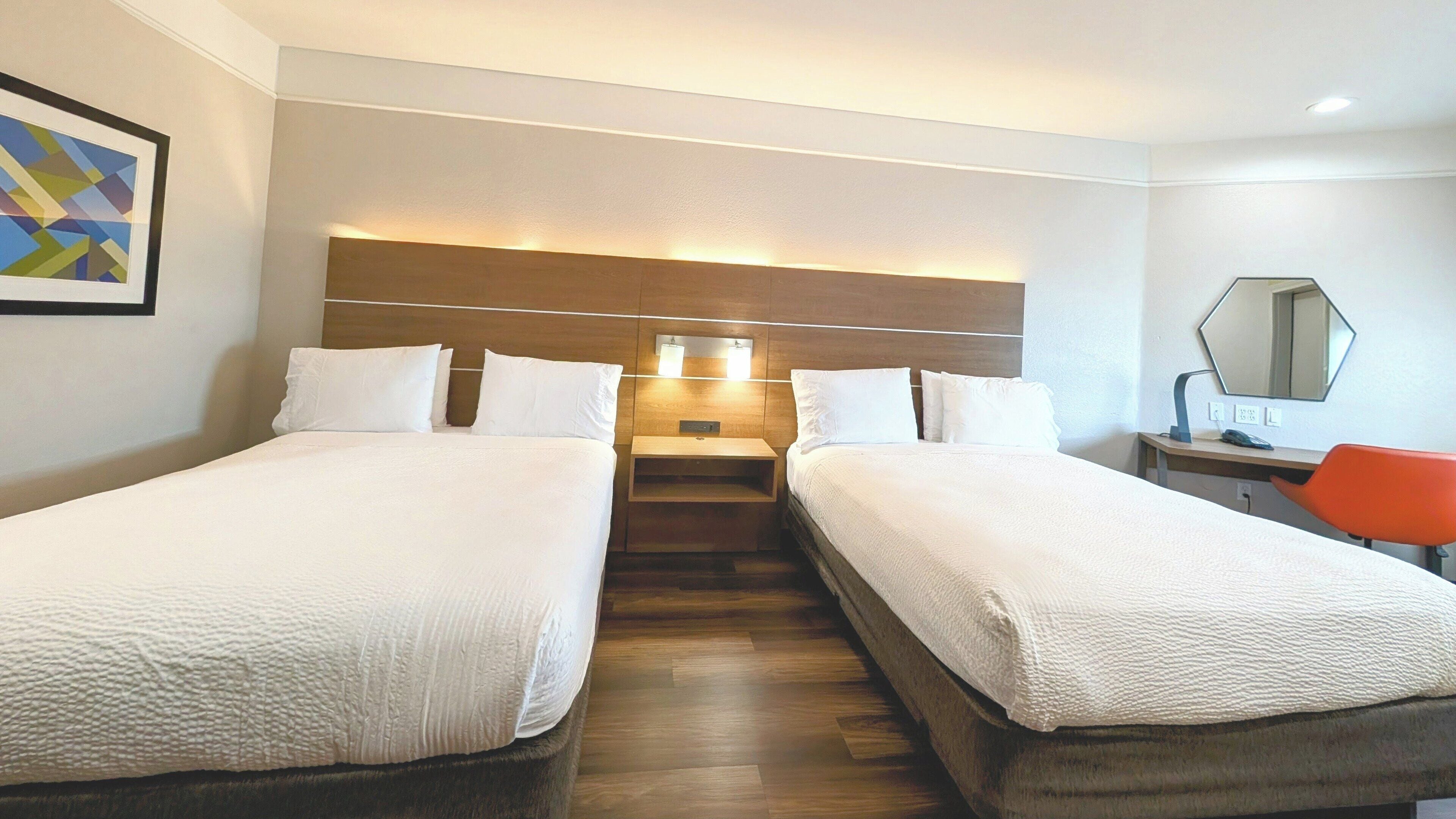 Premium bedding, down comforters, desk, blackout drapes