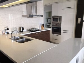 Apartment, 2 Bedrooms | Private kitchenette | Fridge, microwave, oven, stovetop - The Sandalwood, Beijing - Marriott Executive Apartments (Beijing)