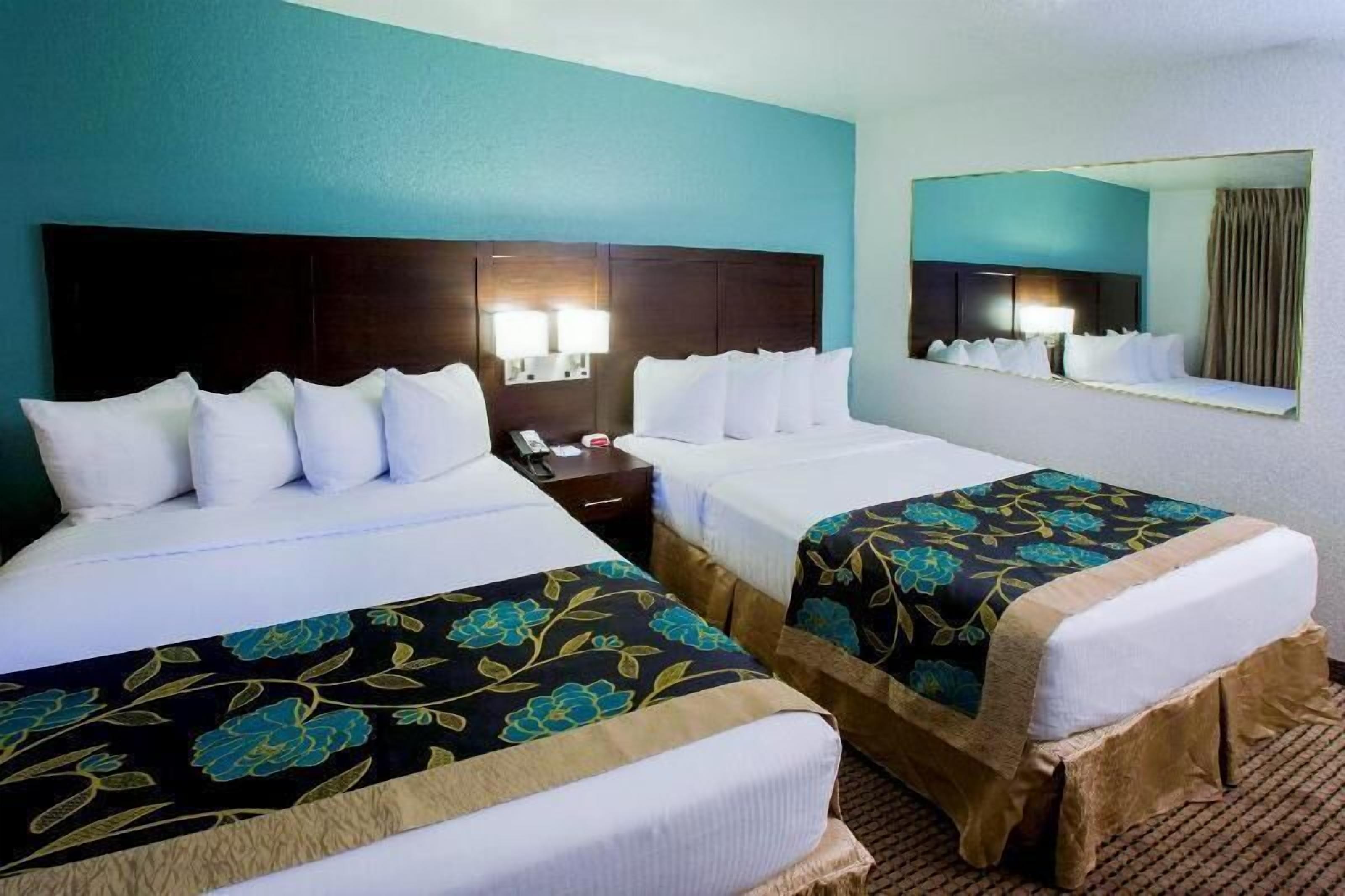 Pillowtop beds, desk, iron/ironing board, rollaway beds