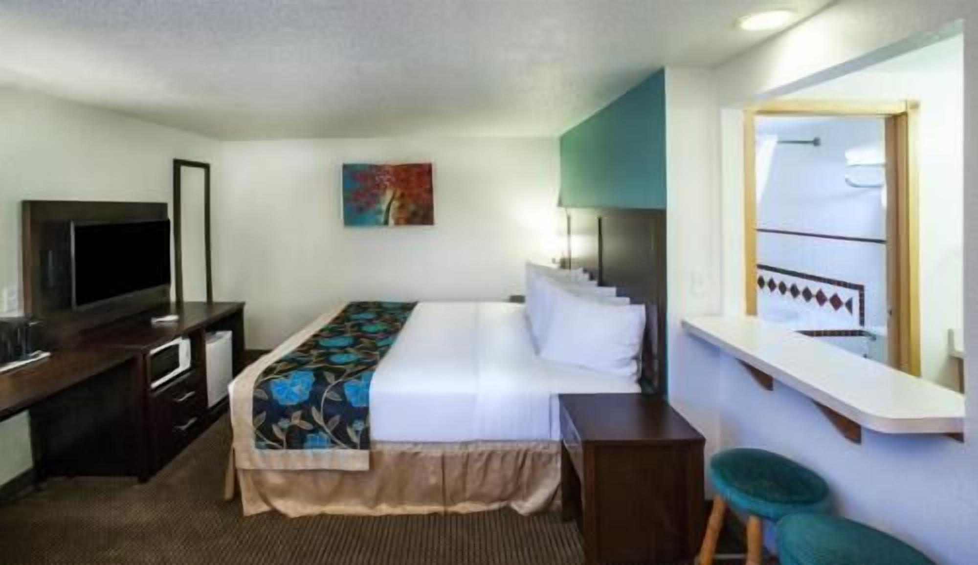 Pillowtop beds, desk, iron/ironing board, rollaway beds