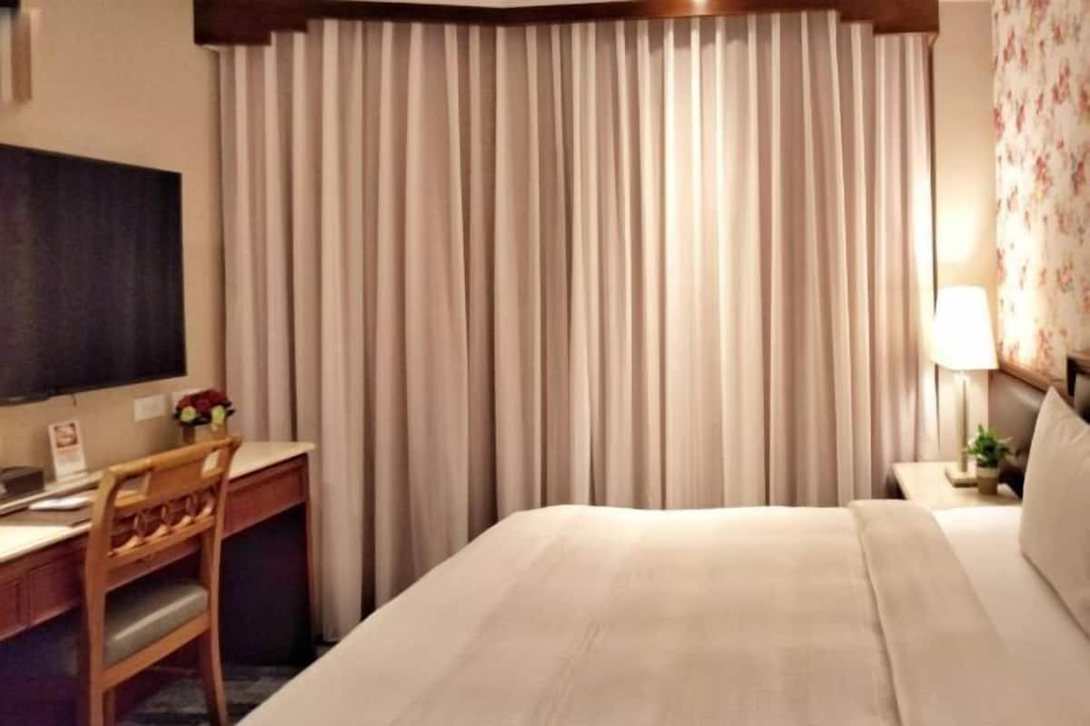Hochwertige Bettwaren, Daunenbettdecken, kostenlose Minibar, Zimmersafe