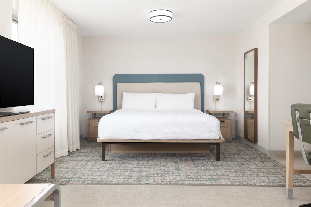Premium bedding, desk, blackout curtains, iron/ironing board