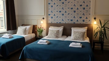 Blackout curtains, iron/ironing board, free WiFi, bed sheets