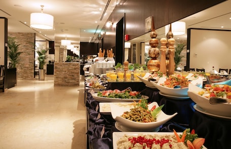 Breakfast, lunch and dinner served . Ramada Hotel & Suites by Wyndham Ajman