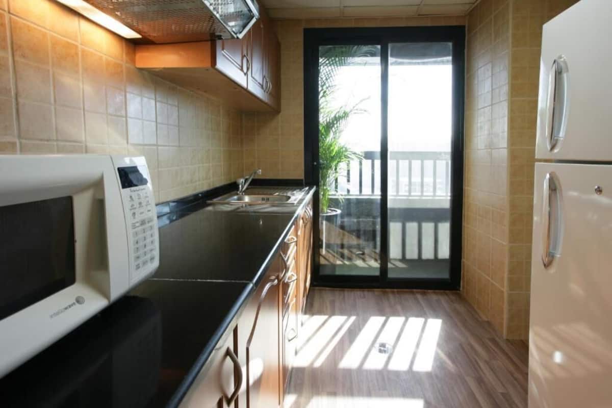 full-sized fridge, microwave, coffee/tea maker, electric kettle