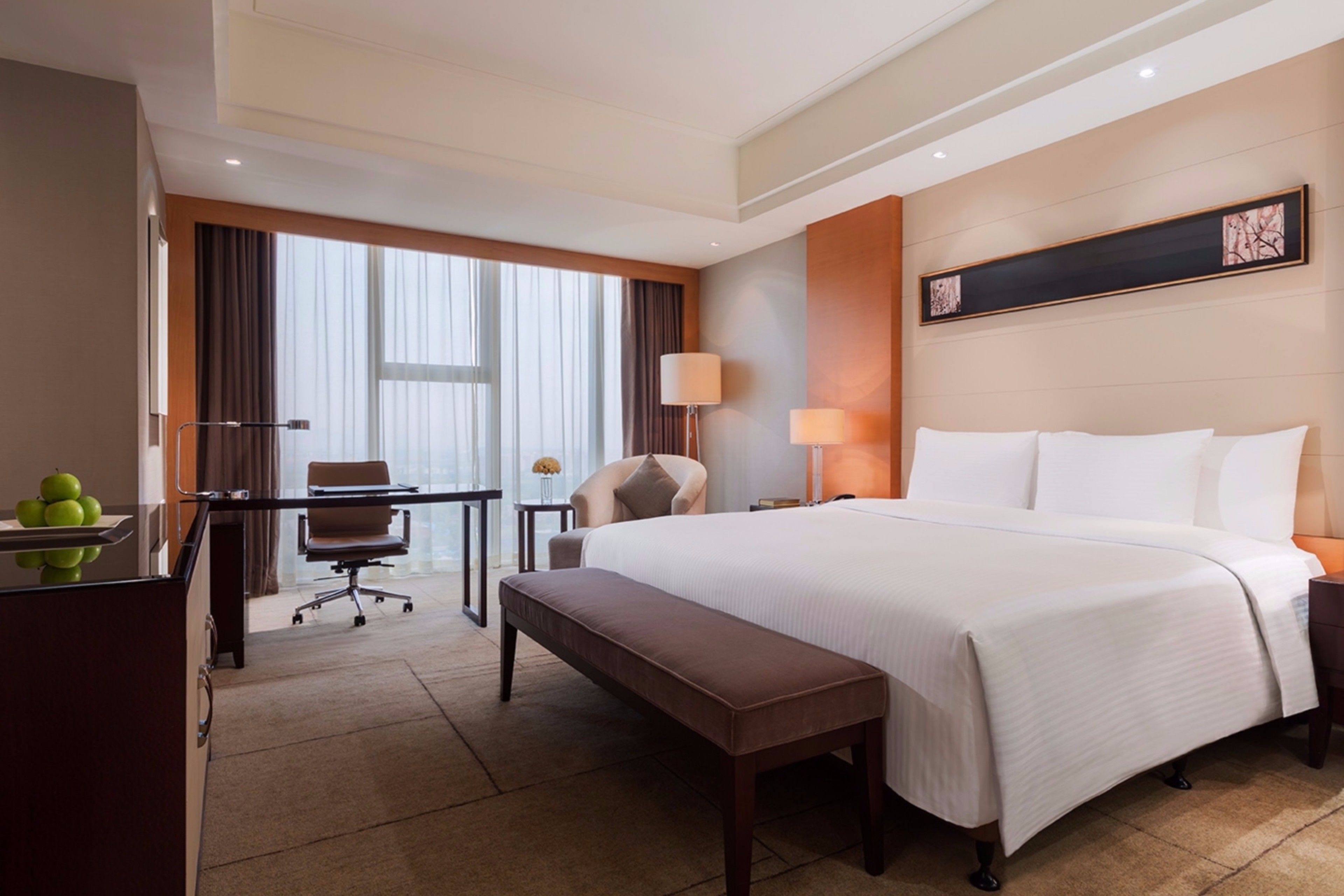 deluxe room, 1 king bed | free minibar items, in-room safe, desk, blackout curtains