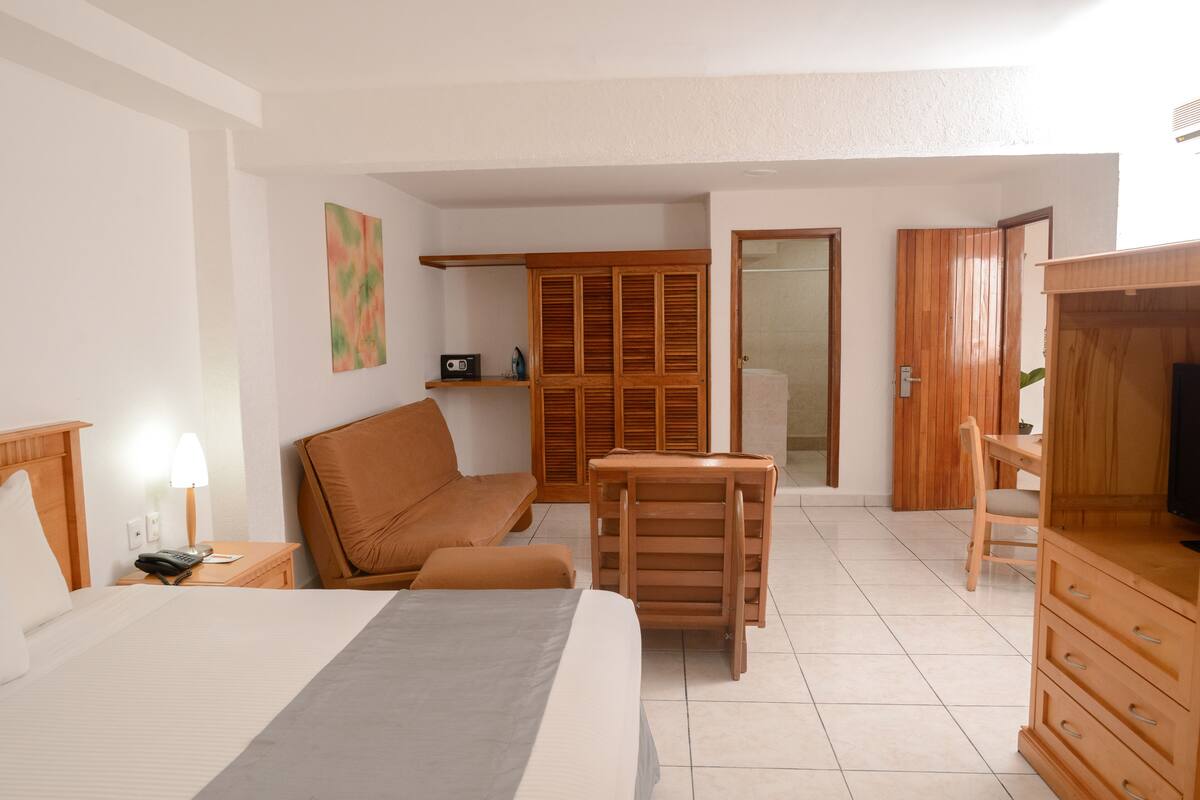 comfort suite | individually decorated, desk, laptop workspace, iron/ironing board