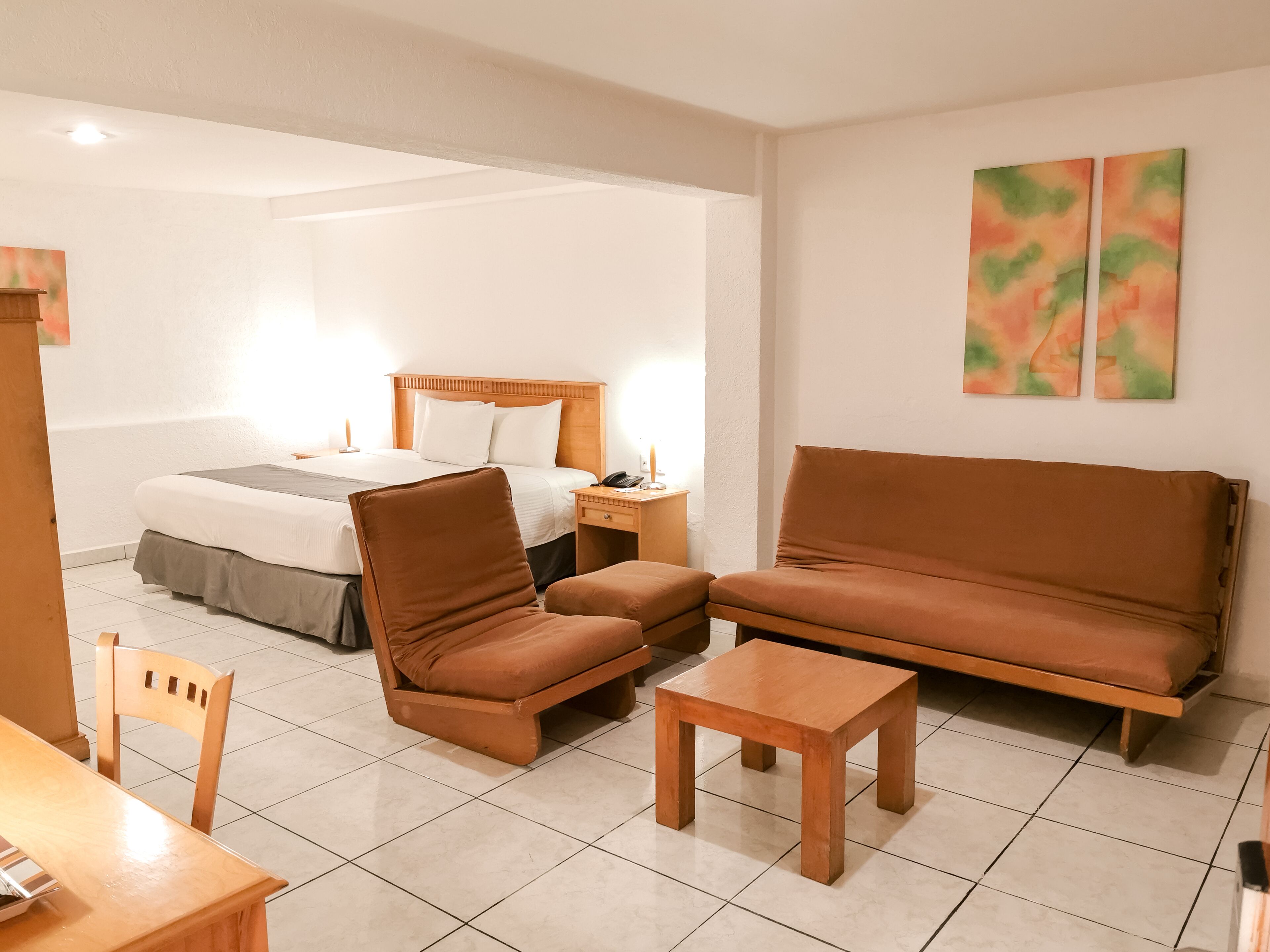 comfort suite | individually decorated, desk, laptop workspace, iron/ironing board