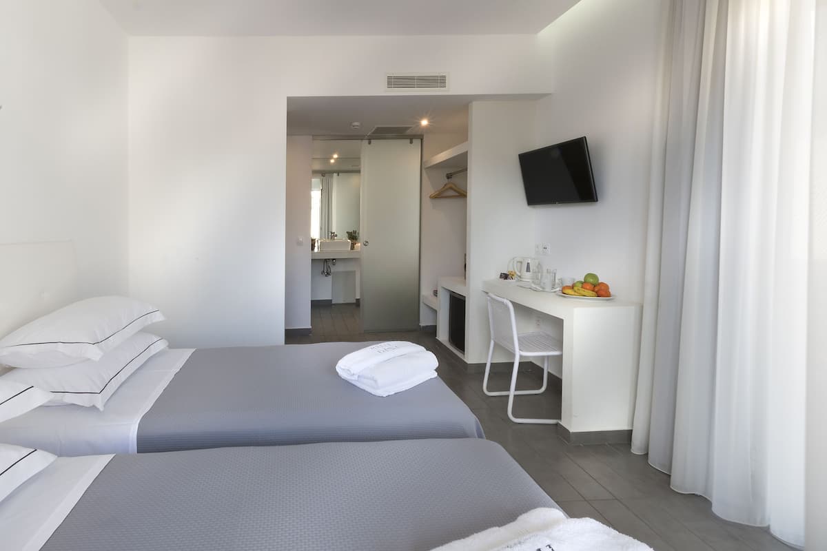 Deluxe-Doppel- oder -Zweibettzimmer | 1 Schlafzimmer, Minibar, Zimmersafe, Schreibtisch