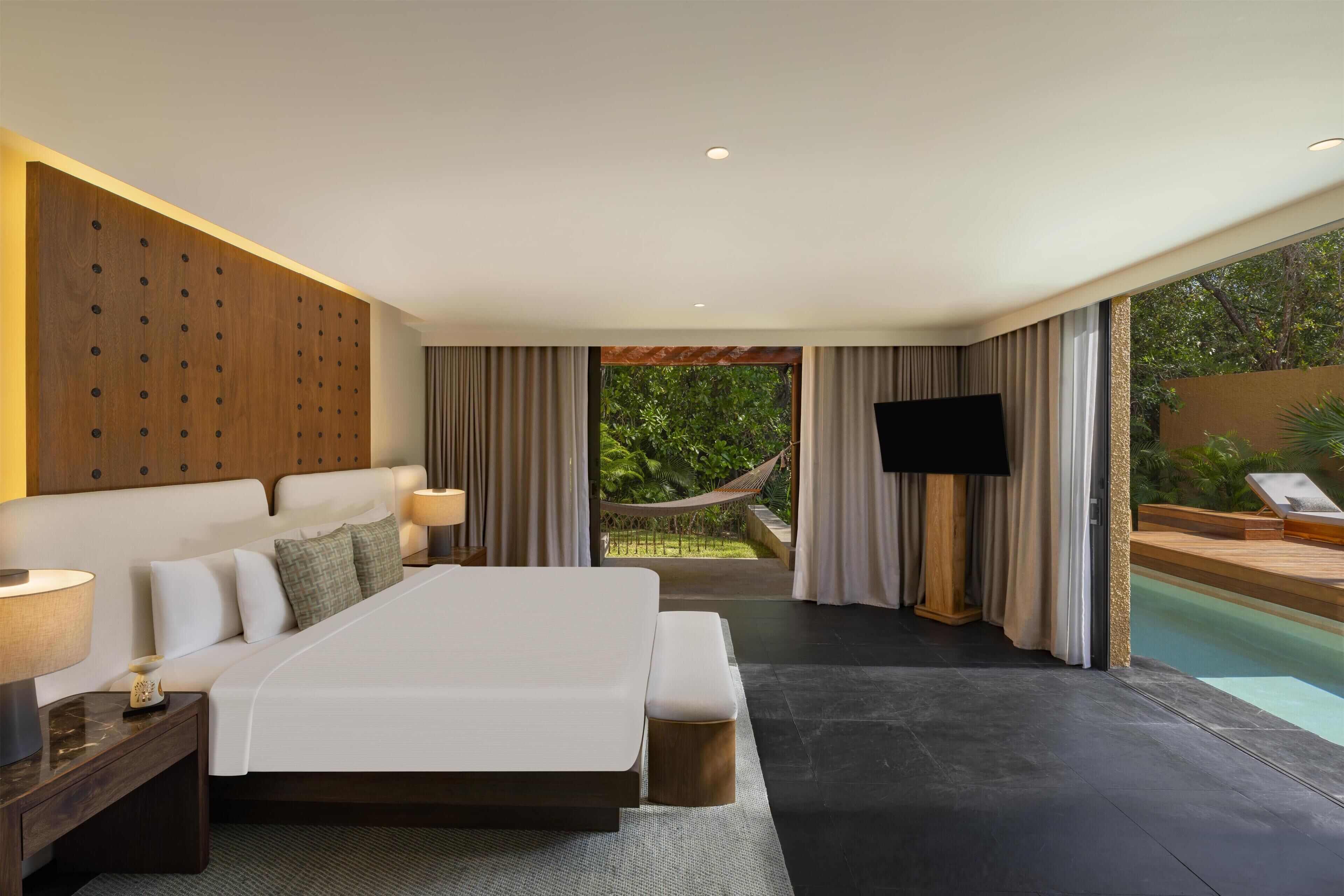 Villa | Luxe beddengoed, donsdekens, een minibar, een kluis op de kamer