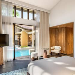 Premium bedding, down comforters, minibar, in-room safe