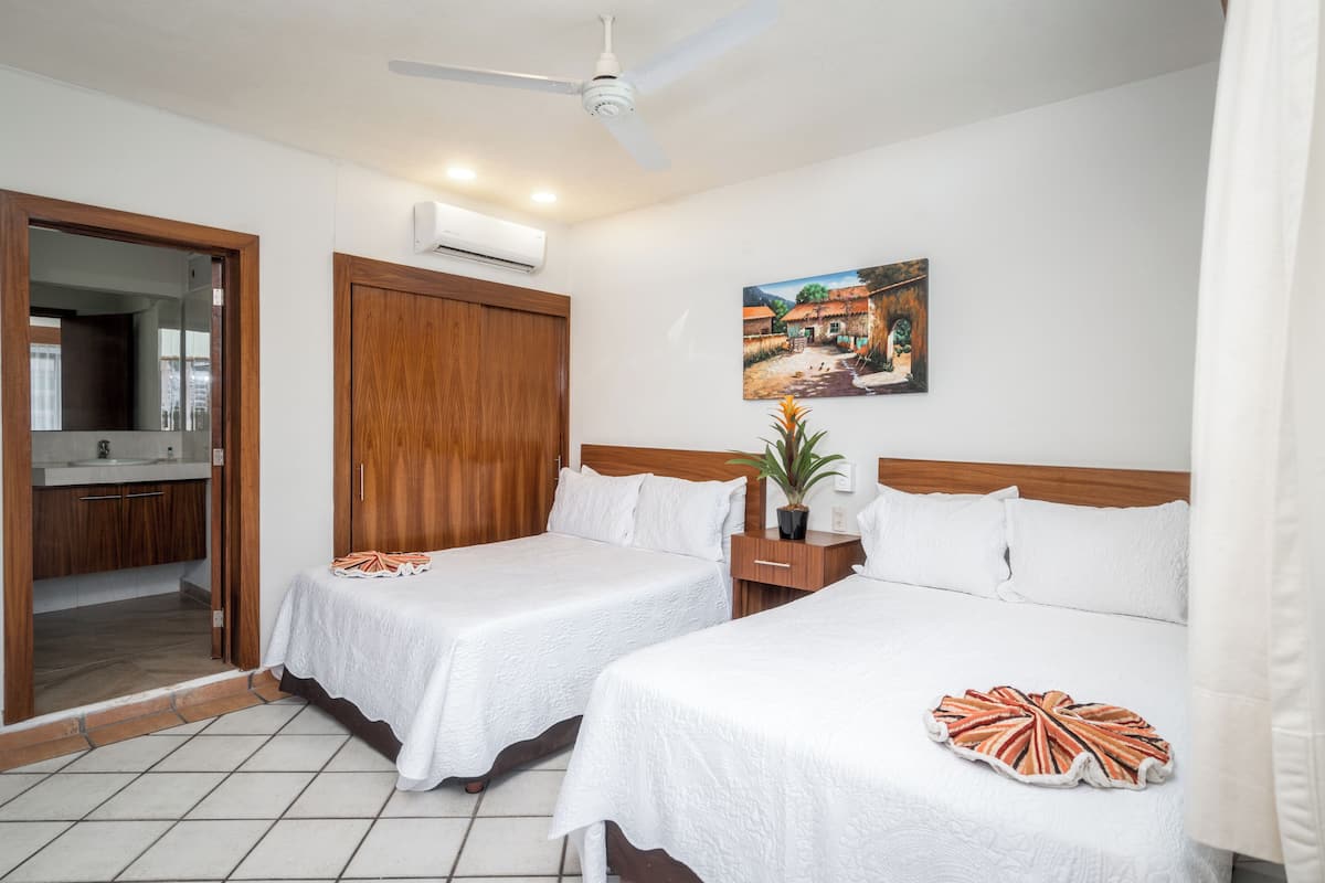 Standard Room, 2 Double Beds | 1 bedroom, blackout drapes, iron/ironing board, bed sheets