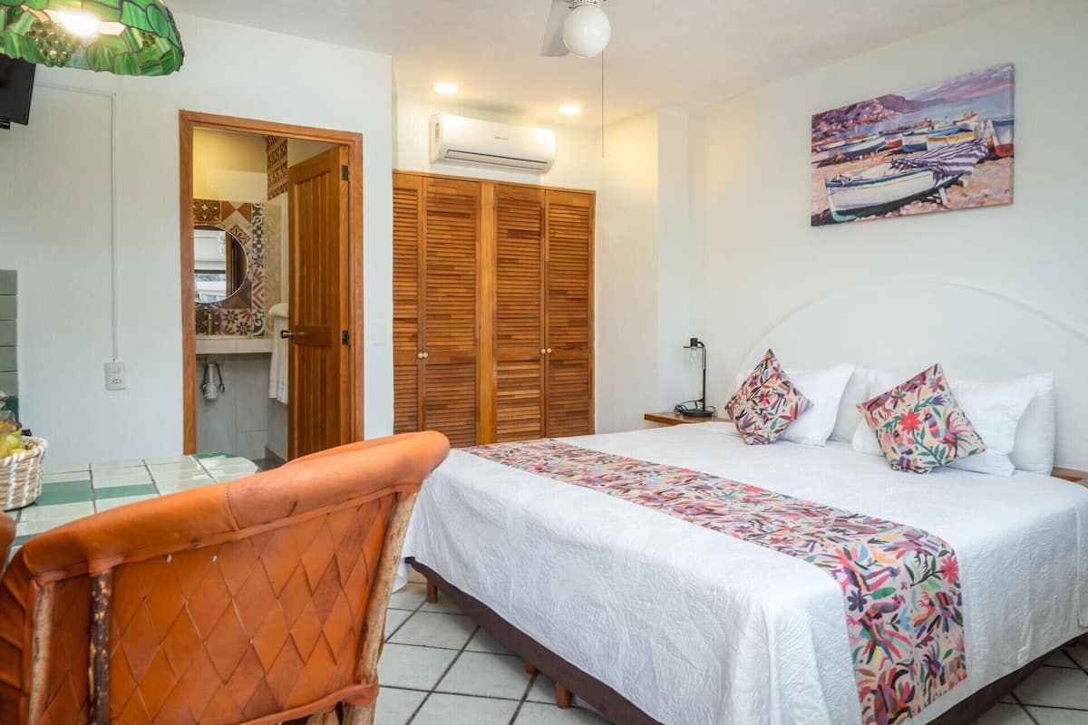 1 bedroom, blackout drapes, iron/ironing board, bed sheets
