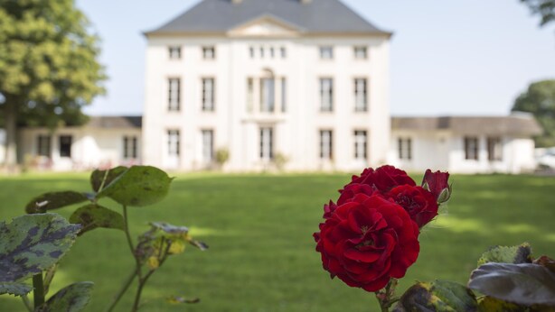 A large white building with a symmetrical facade and multiple windows. - Ma Normandie by Popinns (Breville-les-Monts)