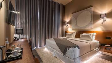 Ropa de cama de alta calidad y minibar