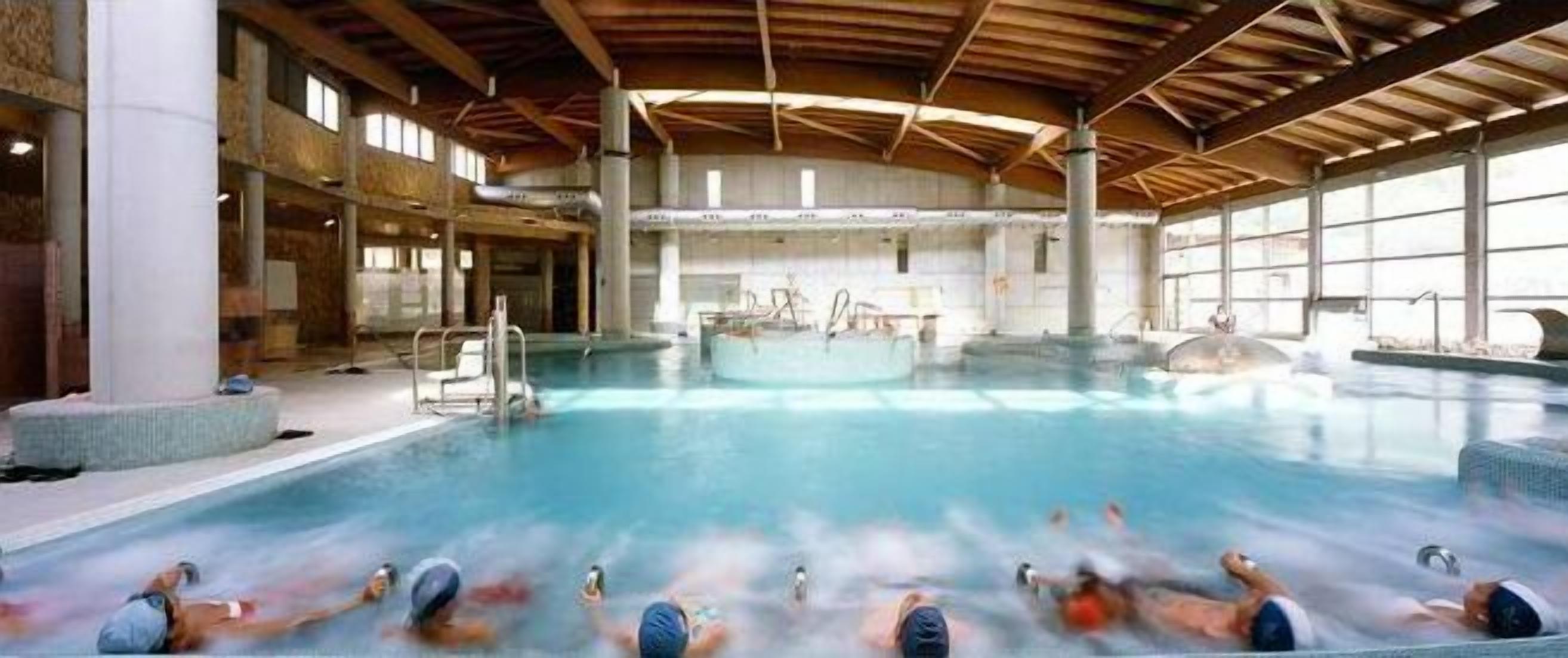 indoor pool, outdoor pool, open 9:00 am to 9:00 pm, pool umbrellas
