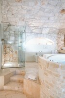 Suite Master | Bathroom | Designer toiletries, hair dryer, bathrobes, slippers