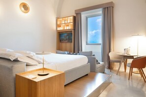 Frette Italian sheets, premium bedding, down duvets, minibar