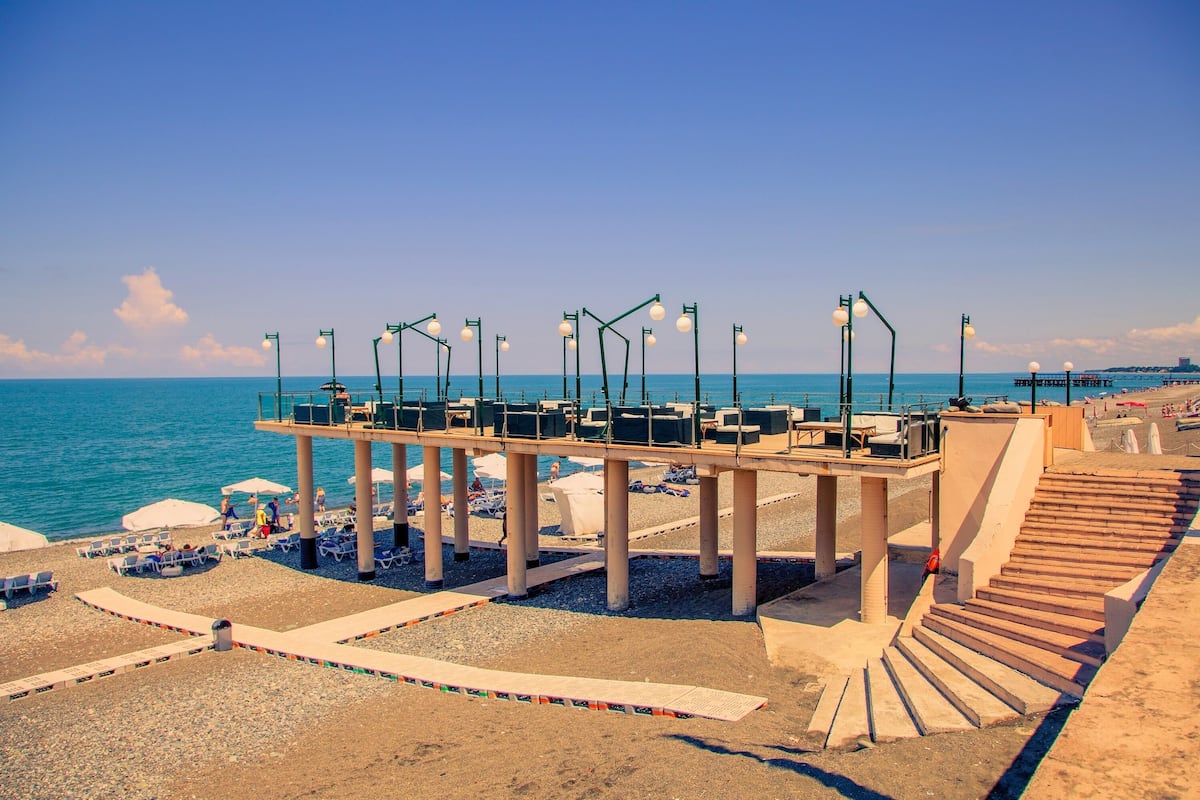 private beach, sun-loungers, beach umbrellas, beach towels