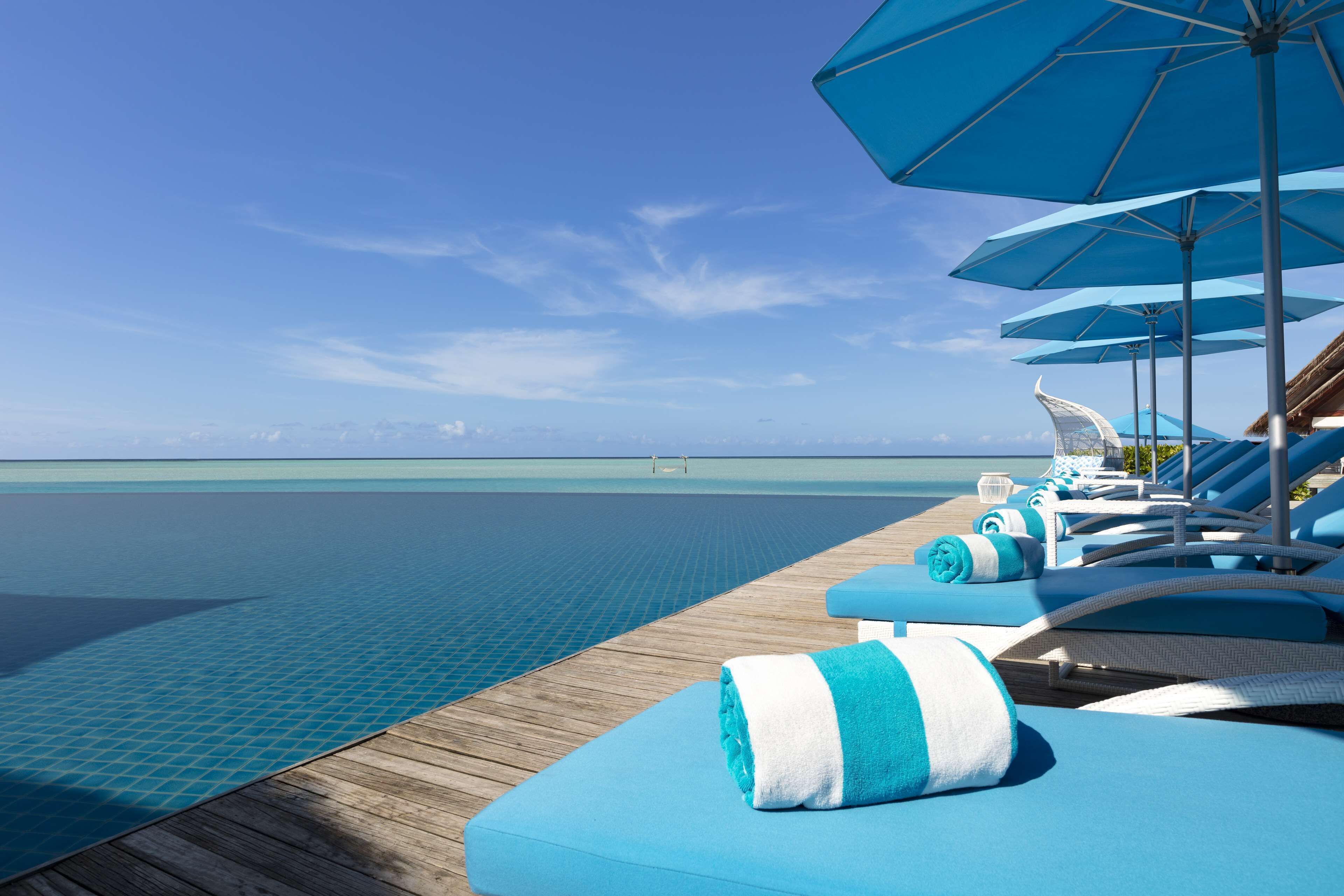 Outdoor pool, pool umbrellas, pool loungers