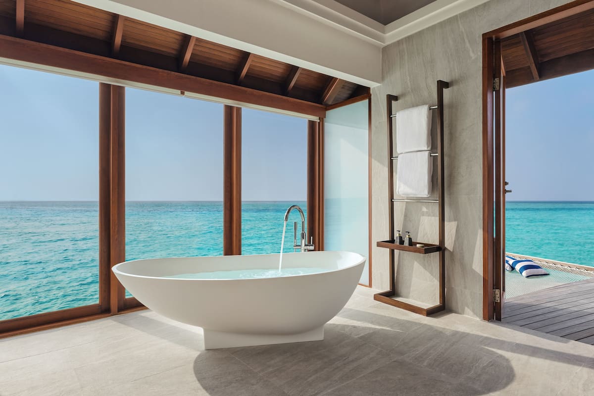 Sunset Over Water Villa | Bathroom | Separate tub and shower, deep soaking tub, rainfall showerhead