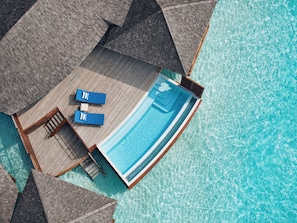 Suíte luxo (Sunset Over Water Pool) | Lençóis italianos Frette, roupas de cama premium, frigobar