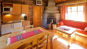 Cabin, Fireplace | Private kitchen | Fridge, electric kettle