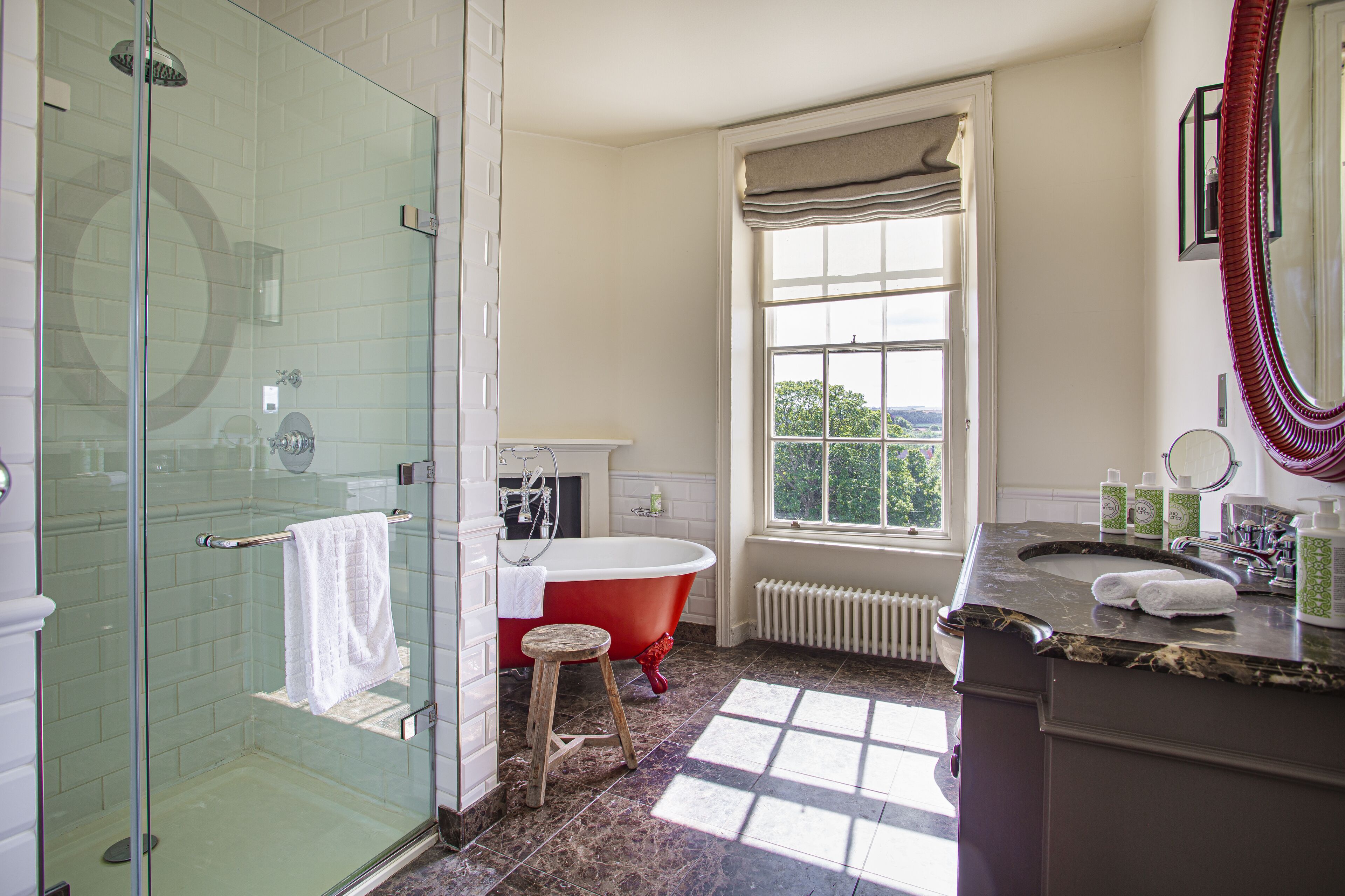 deluxe double room (four poster) | bathroom | rainfall showerhead, designer toiletries, hair dryer, bathrobes