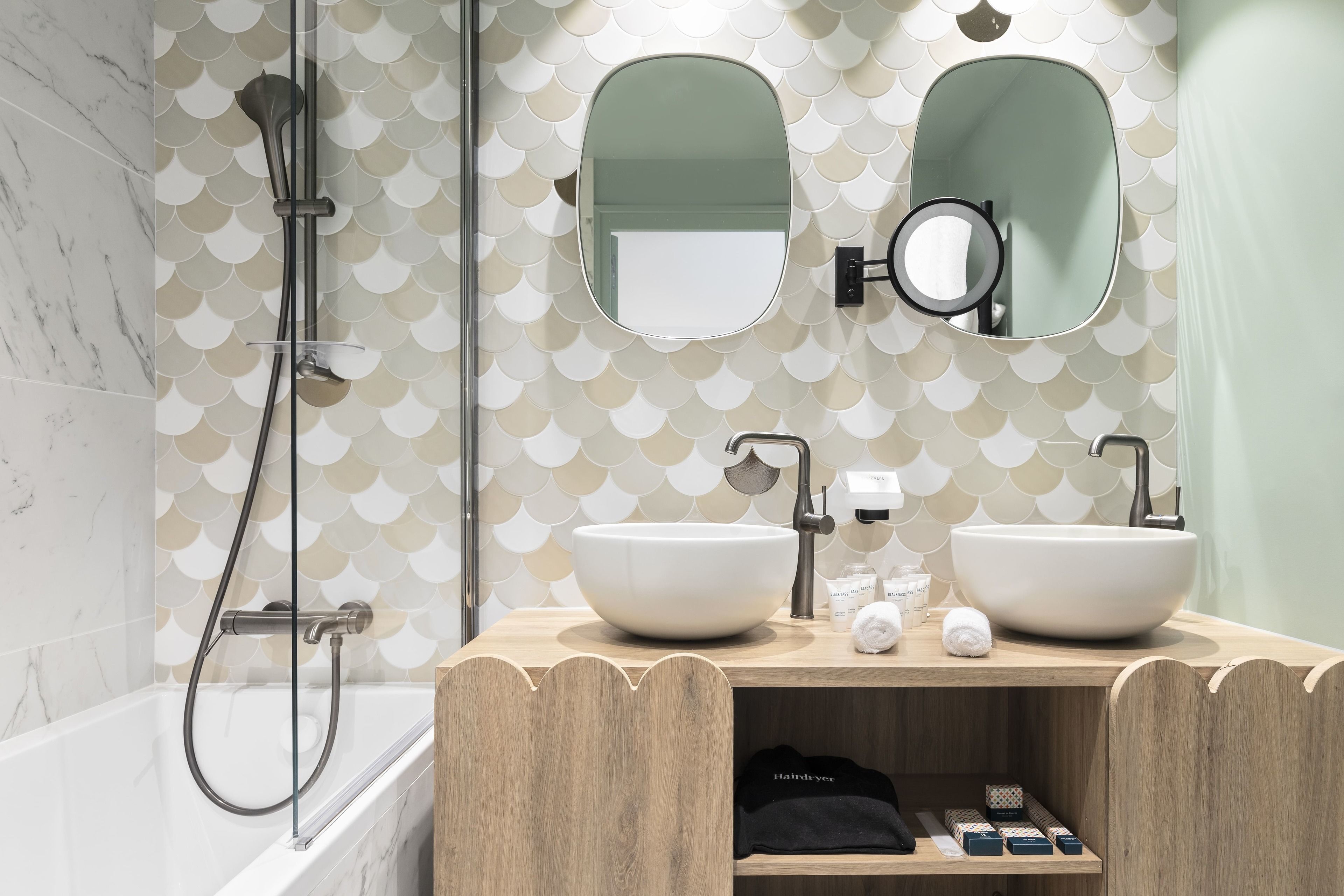 designer toiletries, hair dryer, bathrobes, slippers