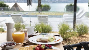 Daily buffet breakfast (EUR 35 per person)