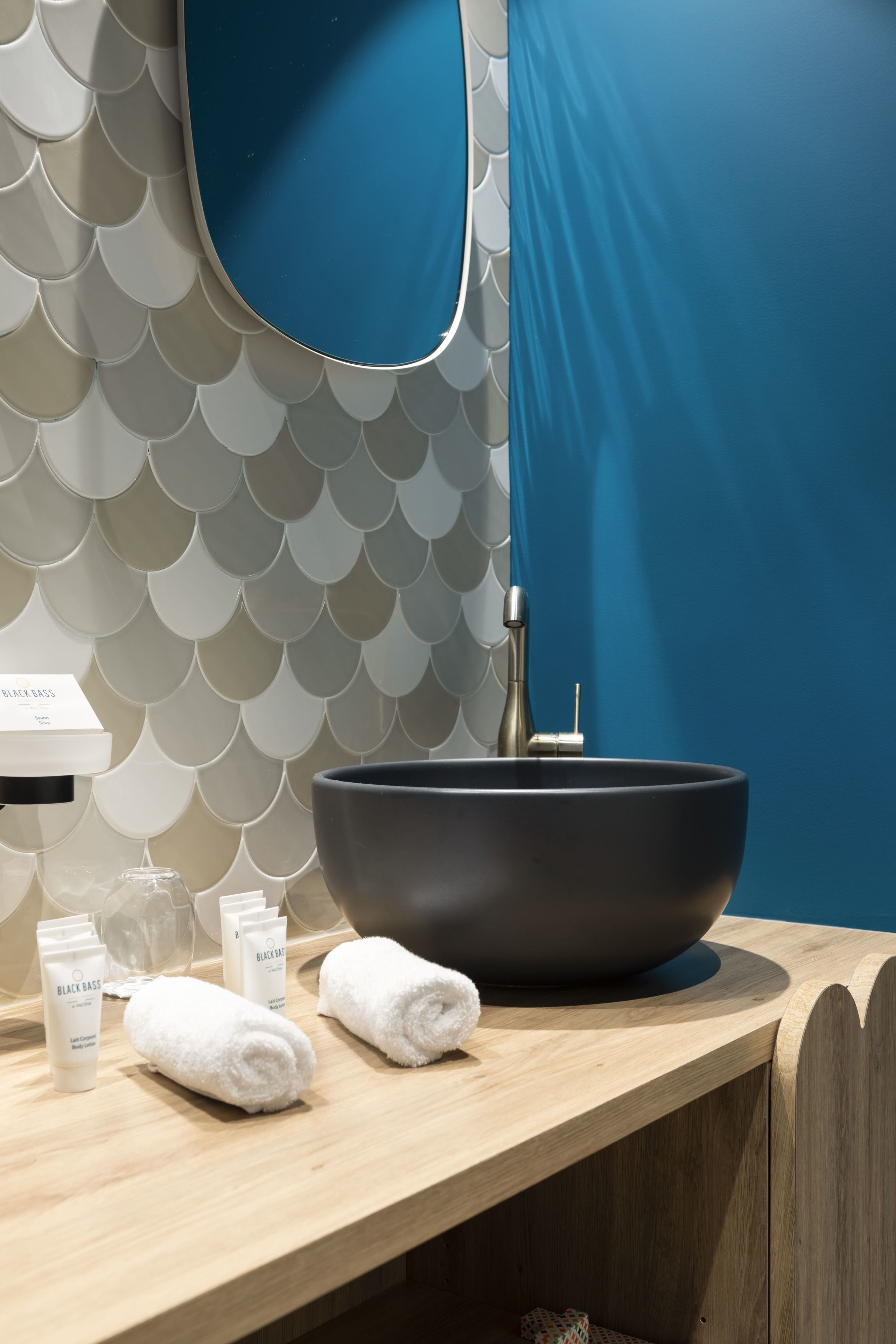 designer toiletries, hair dryer, bathrobes, slippers