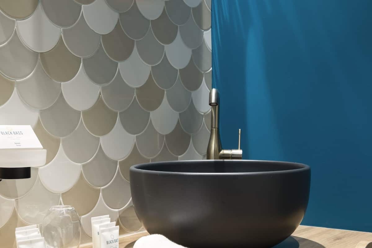 designer toiletries, hair dryer, bathrobes, slippers