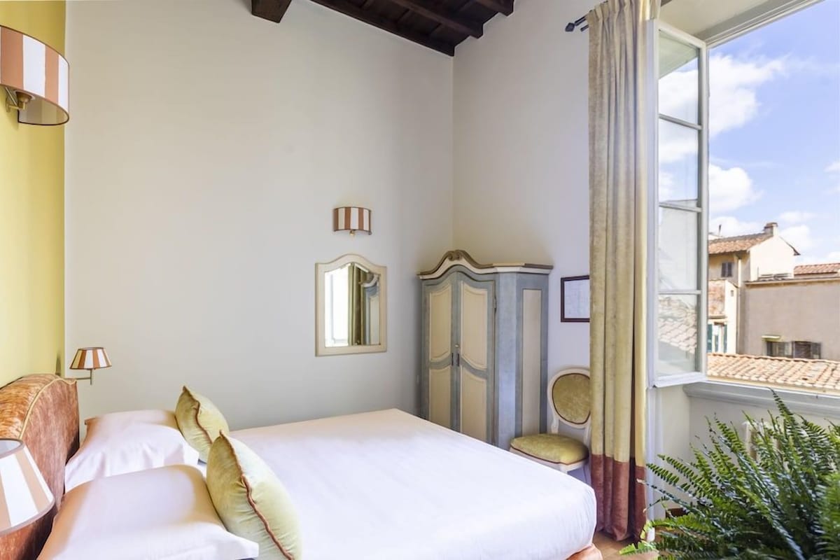 Premium bedding, down comforters, memory foam beds, in-room safe