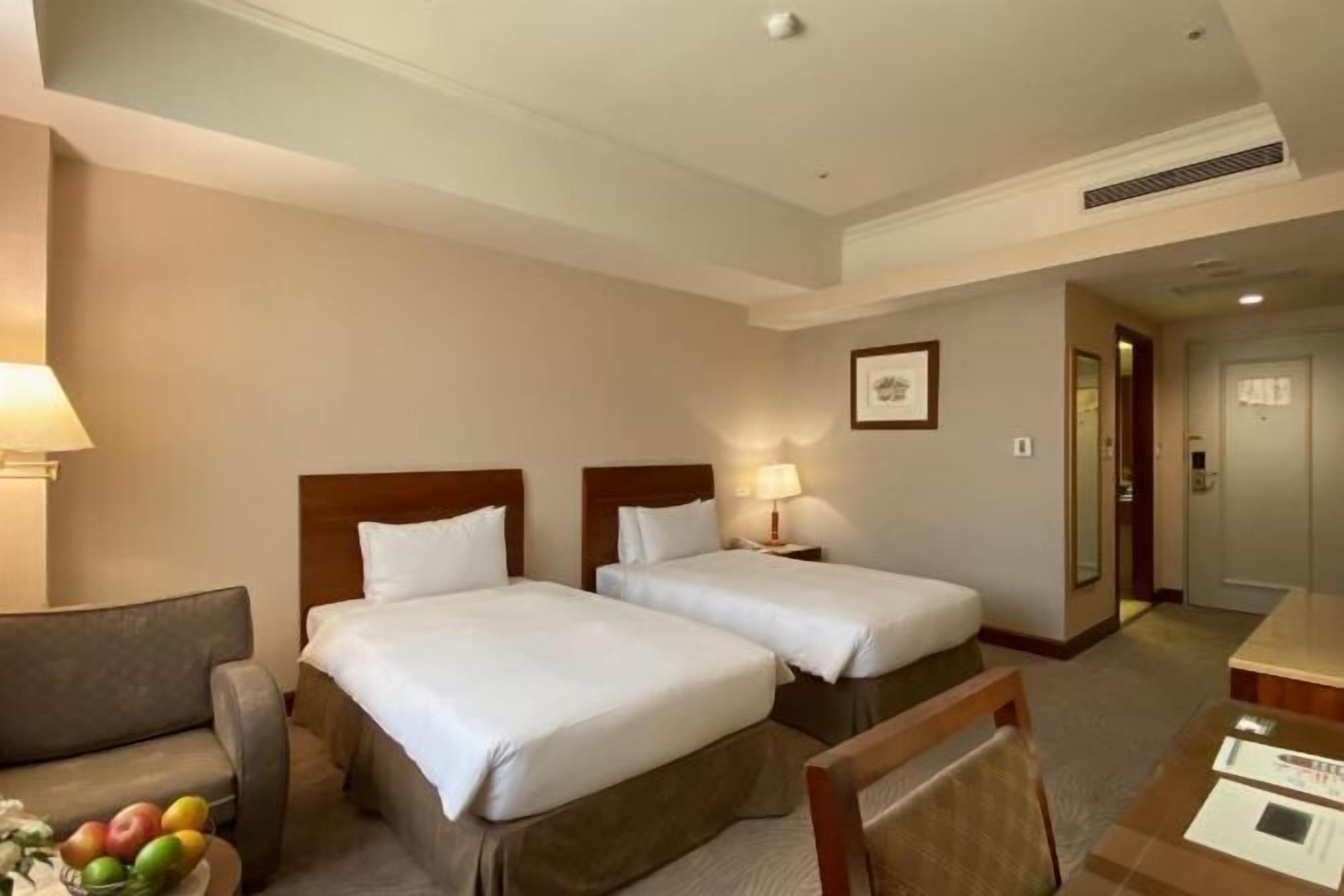 Edredón, camas con pillow-top y caja de seguridad en la habitación 