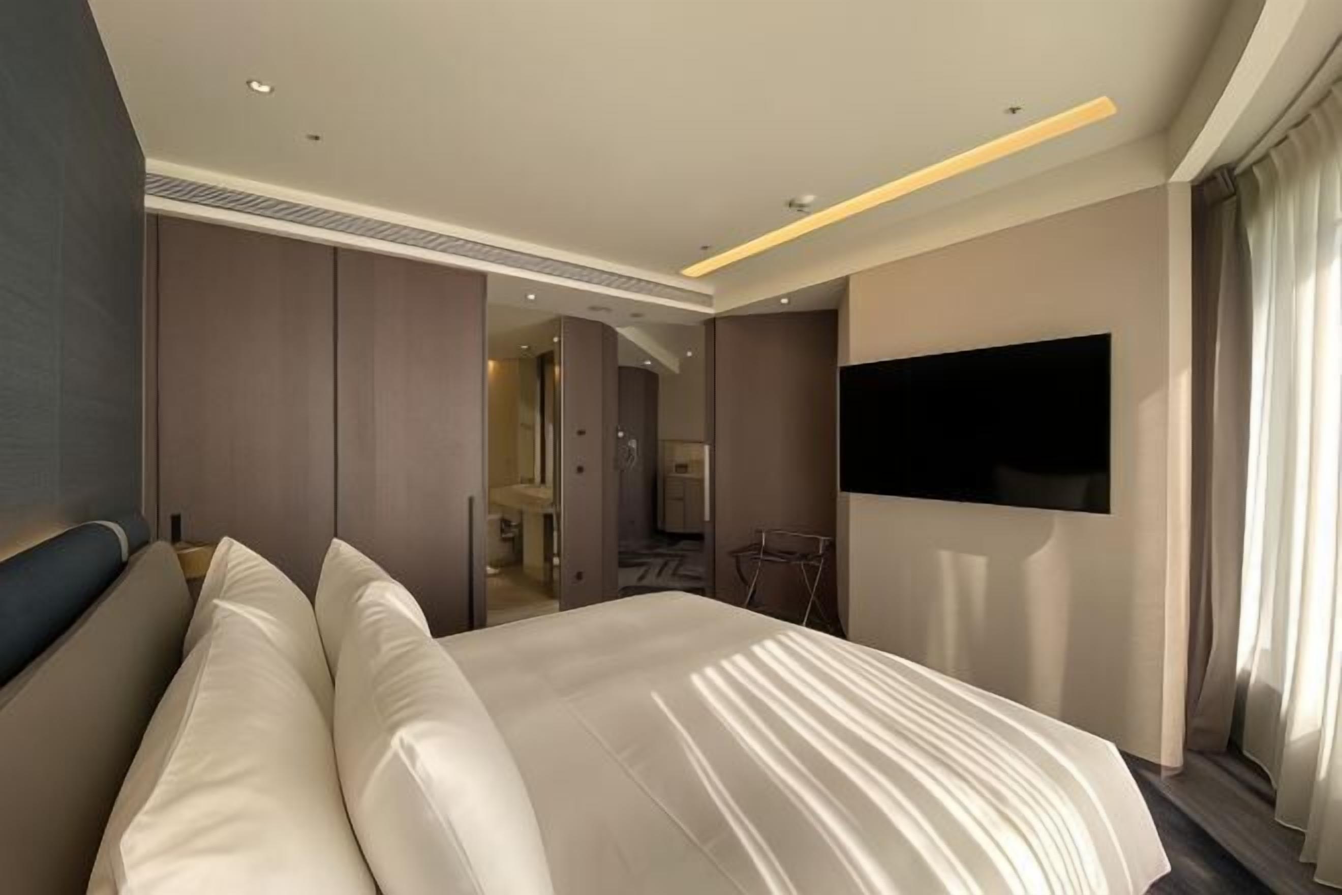 Edredón, camas con pillow-top y caja de seguridad en la habitación 