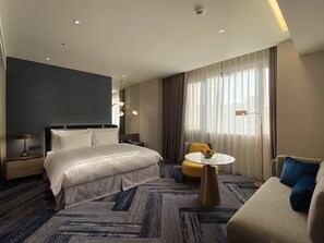 Down duvets, pillow-top beds, in-room safe, laptop workspace