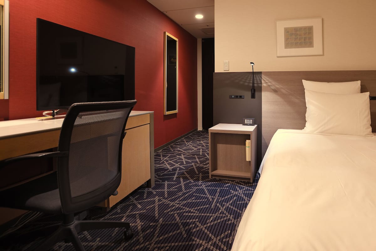 Quarto standard, 1 cama de solteiro | Frigobar, cofres nos quartos, escrivaninha, cortinas blackout