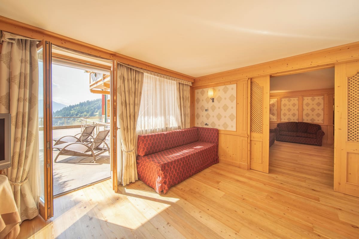 Suite familiare | Biancheria da letto di alta qualità, copriletto in piuma, minibar