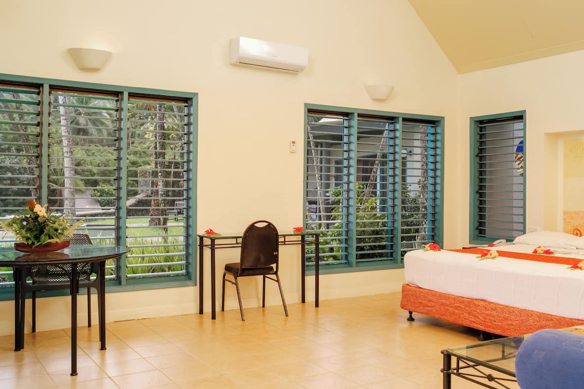 beachfront villa | in-room safe, blackout curtains, iron/ironing board