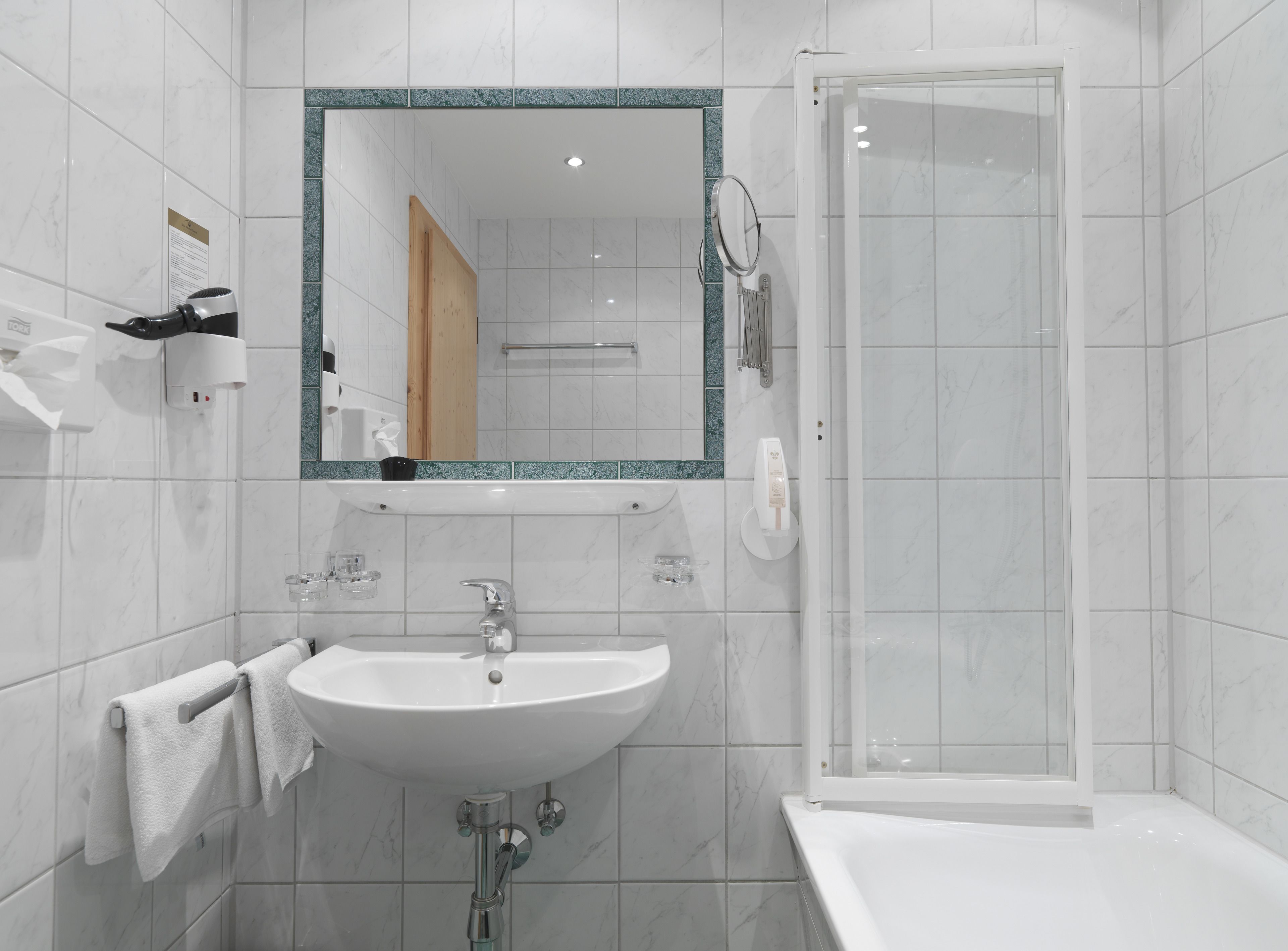 family room | bathroom | hair dryer, bathrobes, towels