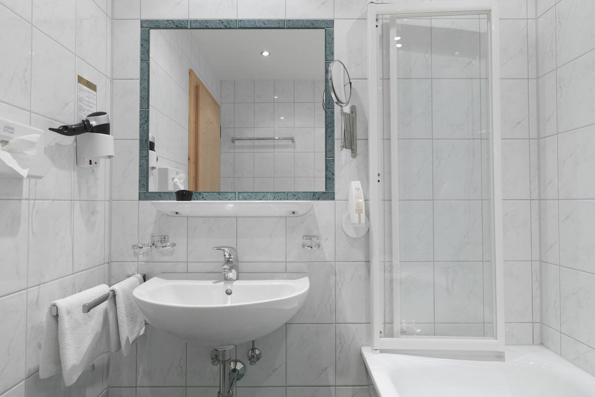 family room | bathroom | hair dryer, bathrobes, towels