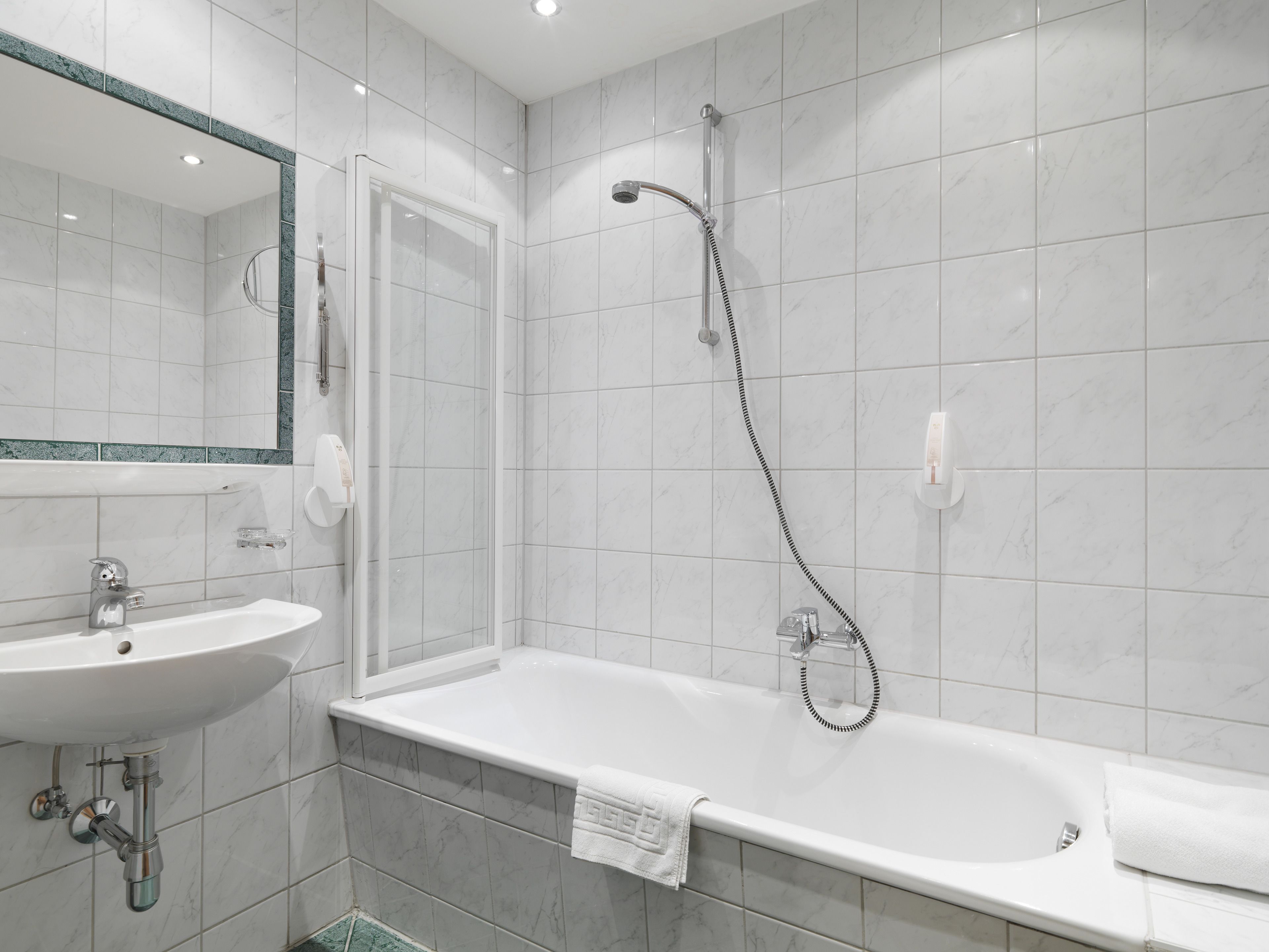 family room | bathroom | hair dryer, bathrobes, towels