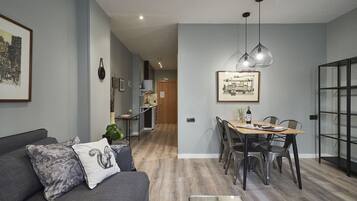 Superior Apartment, 1 Bedroom, 2 Bathrooms | Living area | Plasma TV
