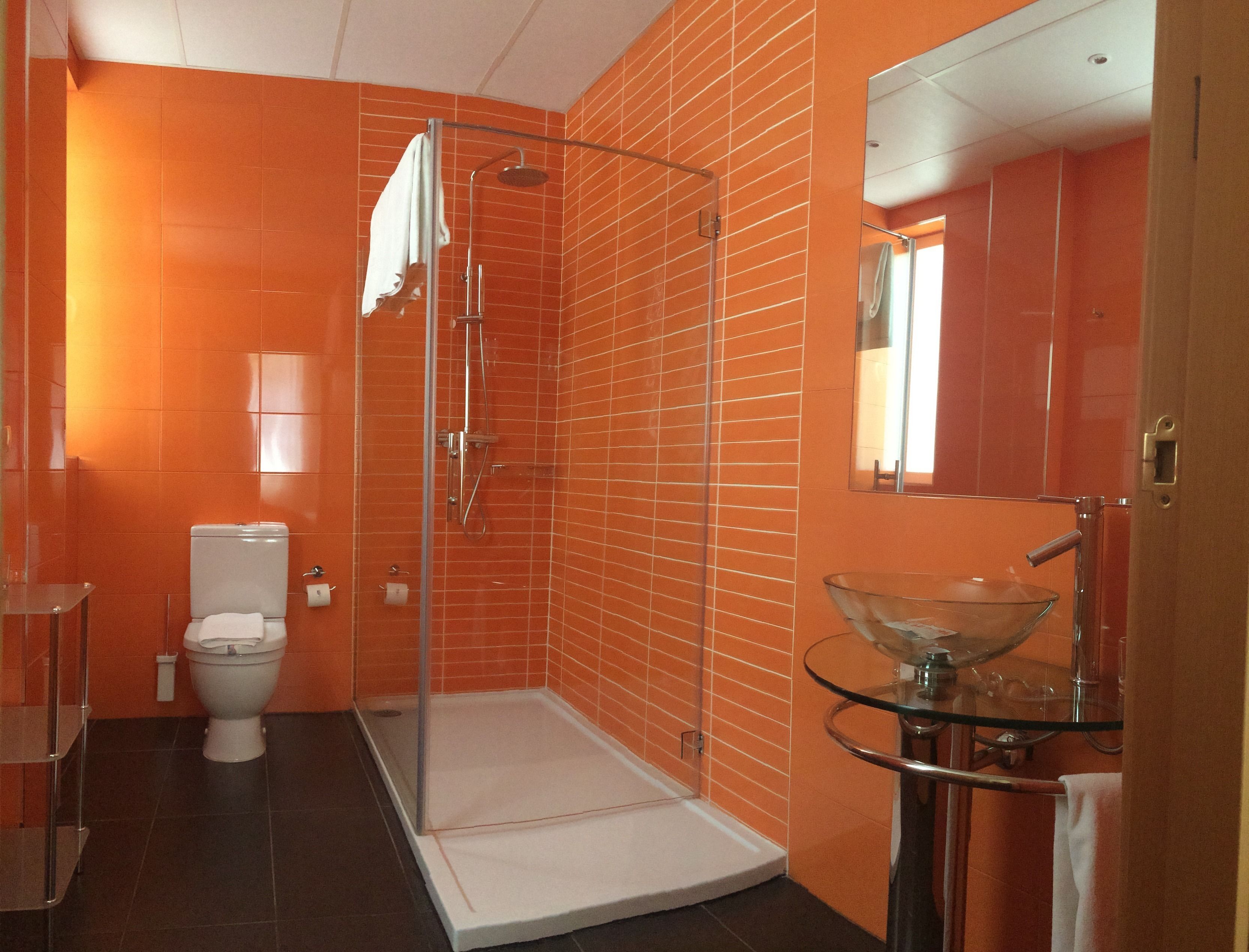 deluxe triple room | bathroom | hair dryer, towels