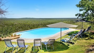 2 outdoor pools, pool umbrellas, pool loungers