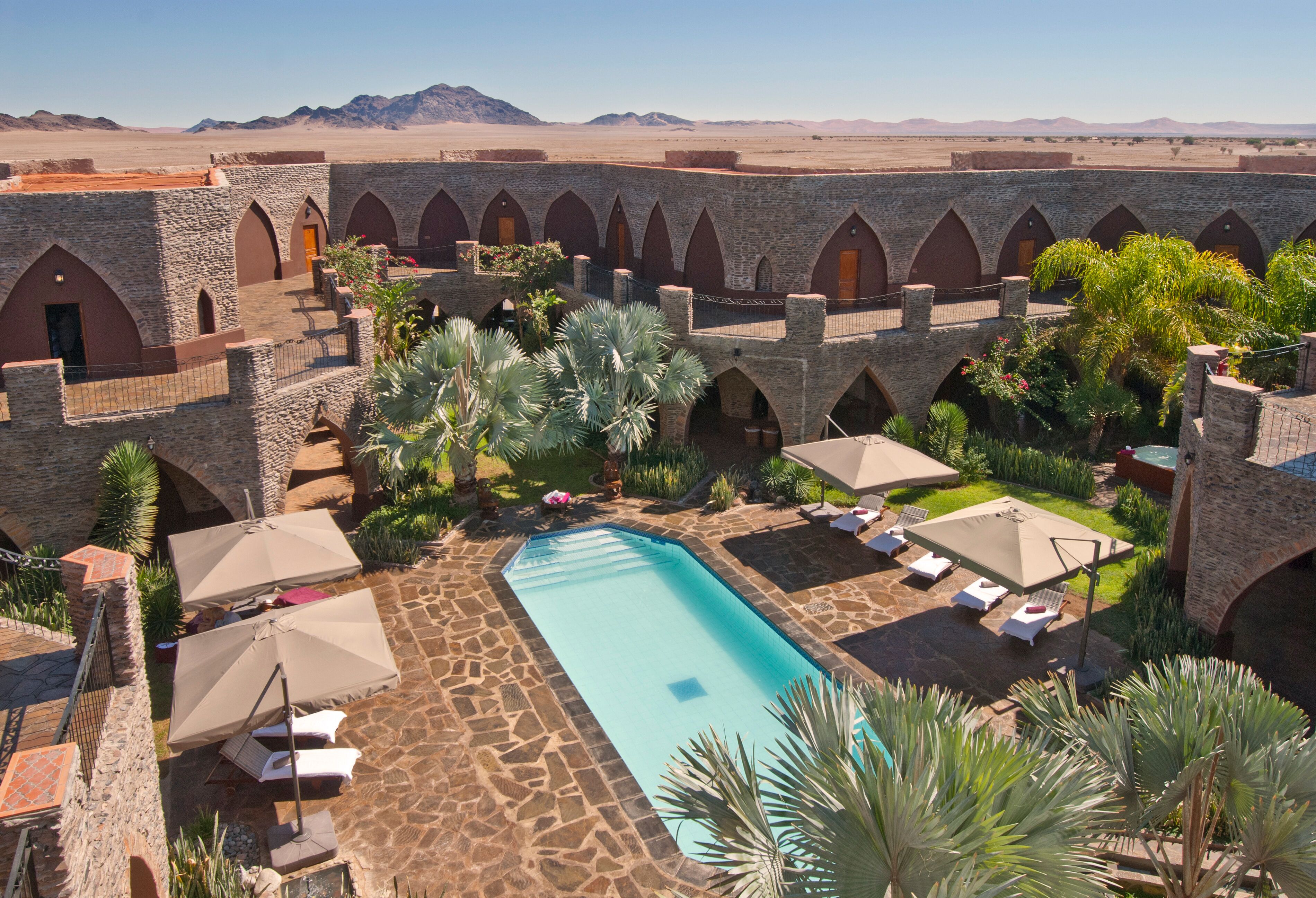 Outdoor pool, pool umbrellas, pool loungers