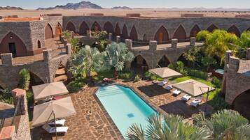 Outdoor pool, pool umbrellas, pool loungers
