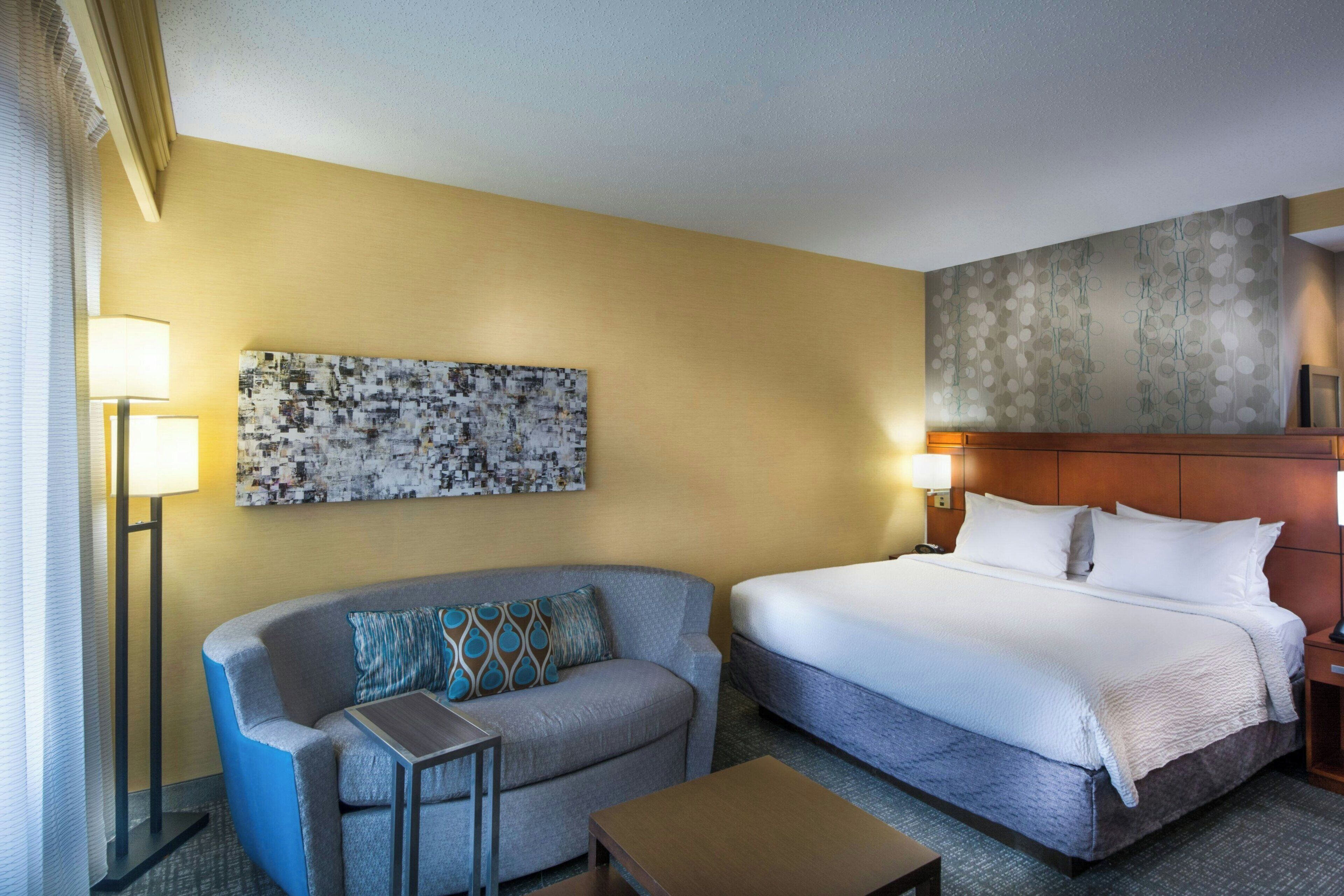 premium bedding, pillow-top beds, desk, laptop workspace