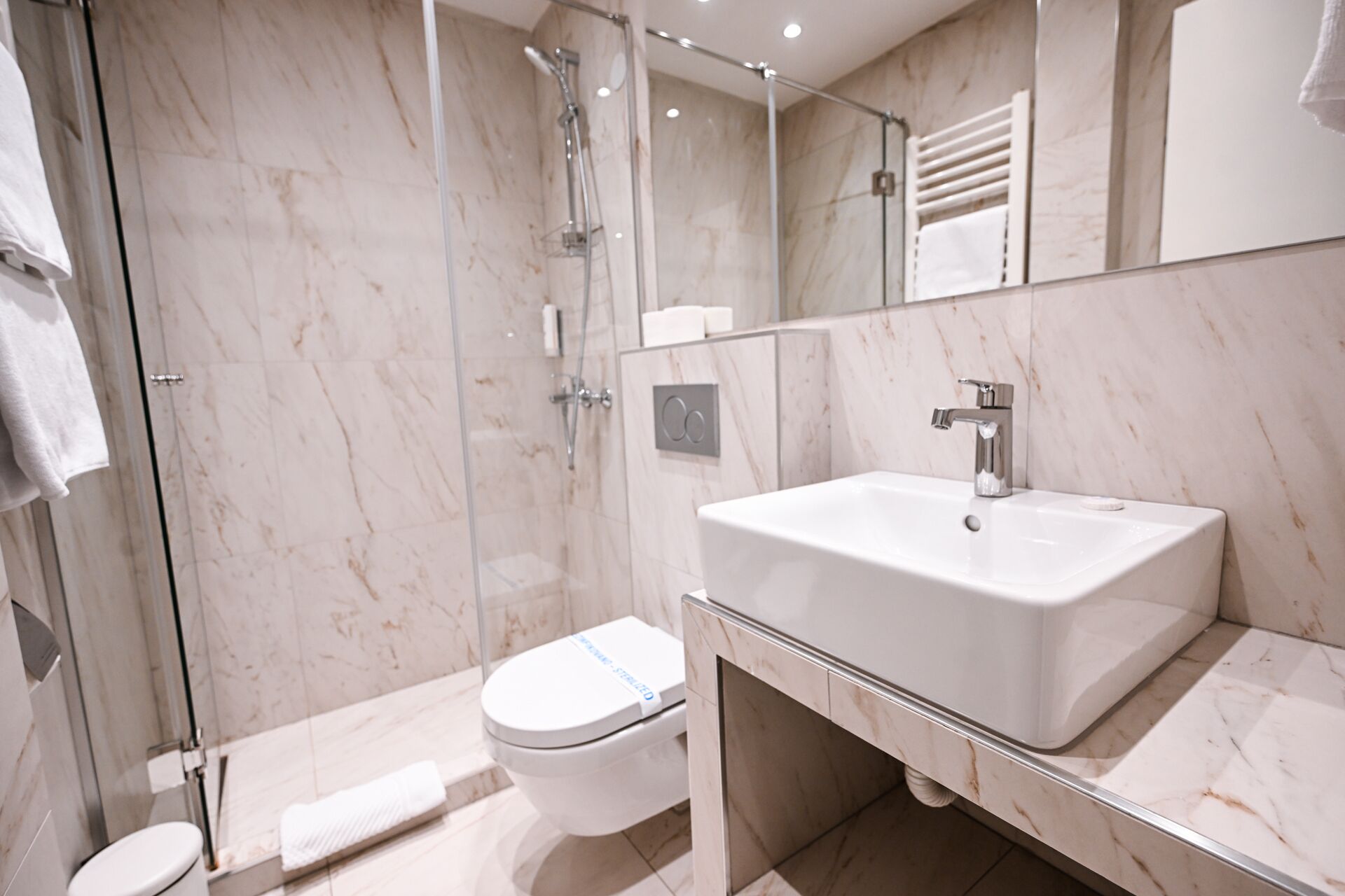 deluxe room | bathroom | hair dryer, bathrobes, towels